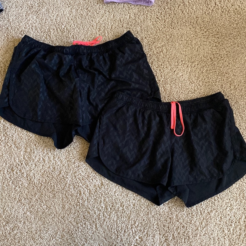 Two pairs of tracks shorts